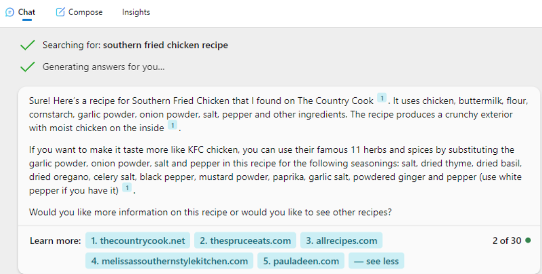 Paula Deen SAIO AI Search bot searching for southern fried chicken recipe. In the learn more section of the response, pauladeen.com is listed as a source.